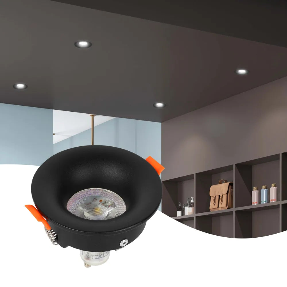 Sleek GU10 downlight fixture illuminating a modern kitchen with minimalist decor, enhancing the contemporary style and brightening the space.143-03992