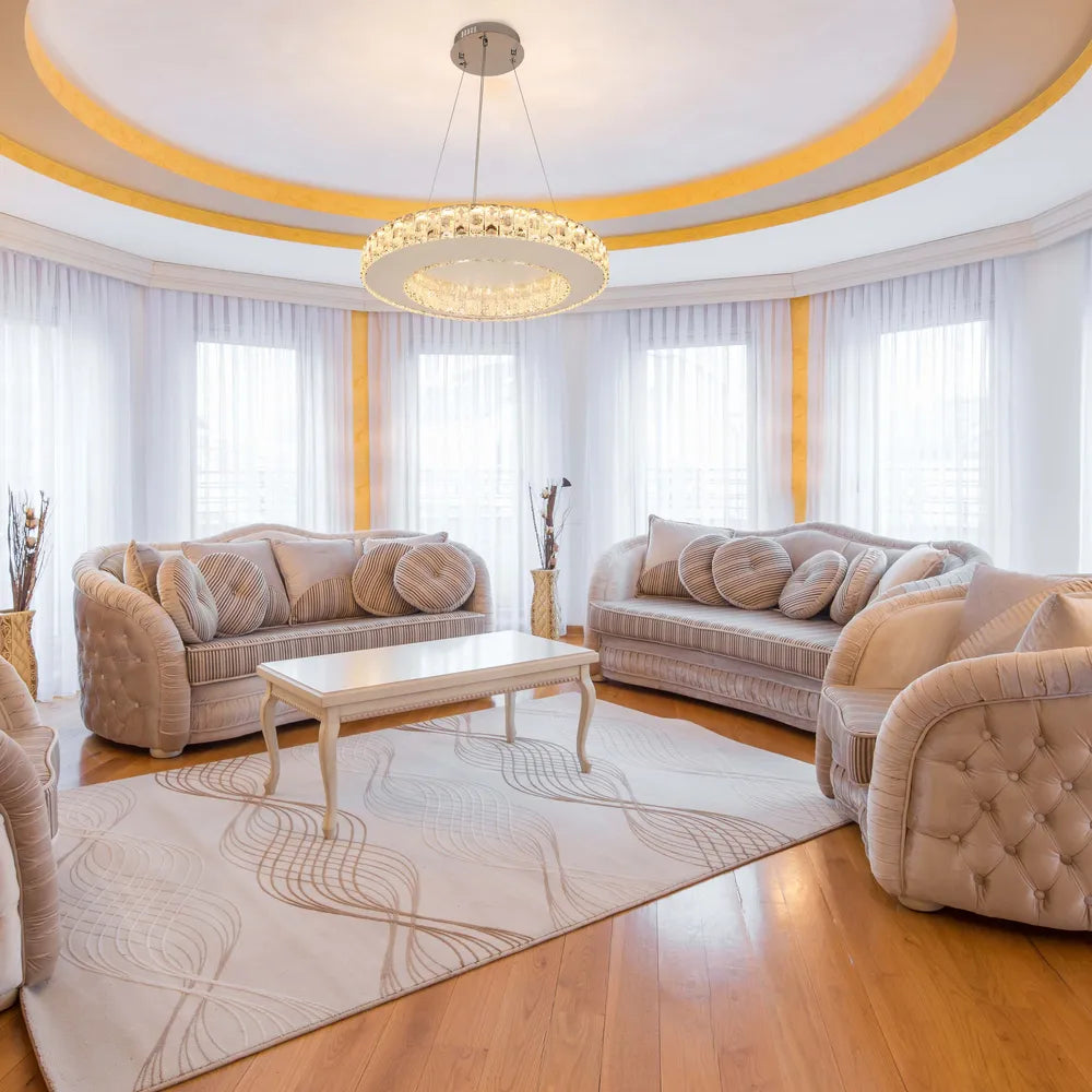 Elegant crystal chandelier in dimpled chrome finish illuminating a modern dining room, enhancing the sophisticated decor with its stunning design.159-18346