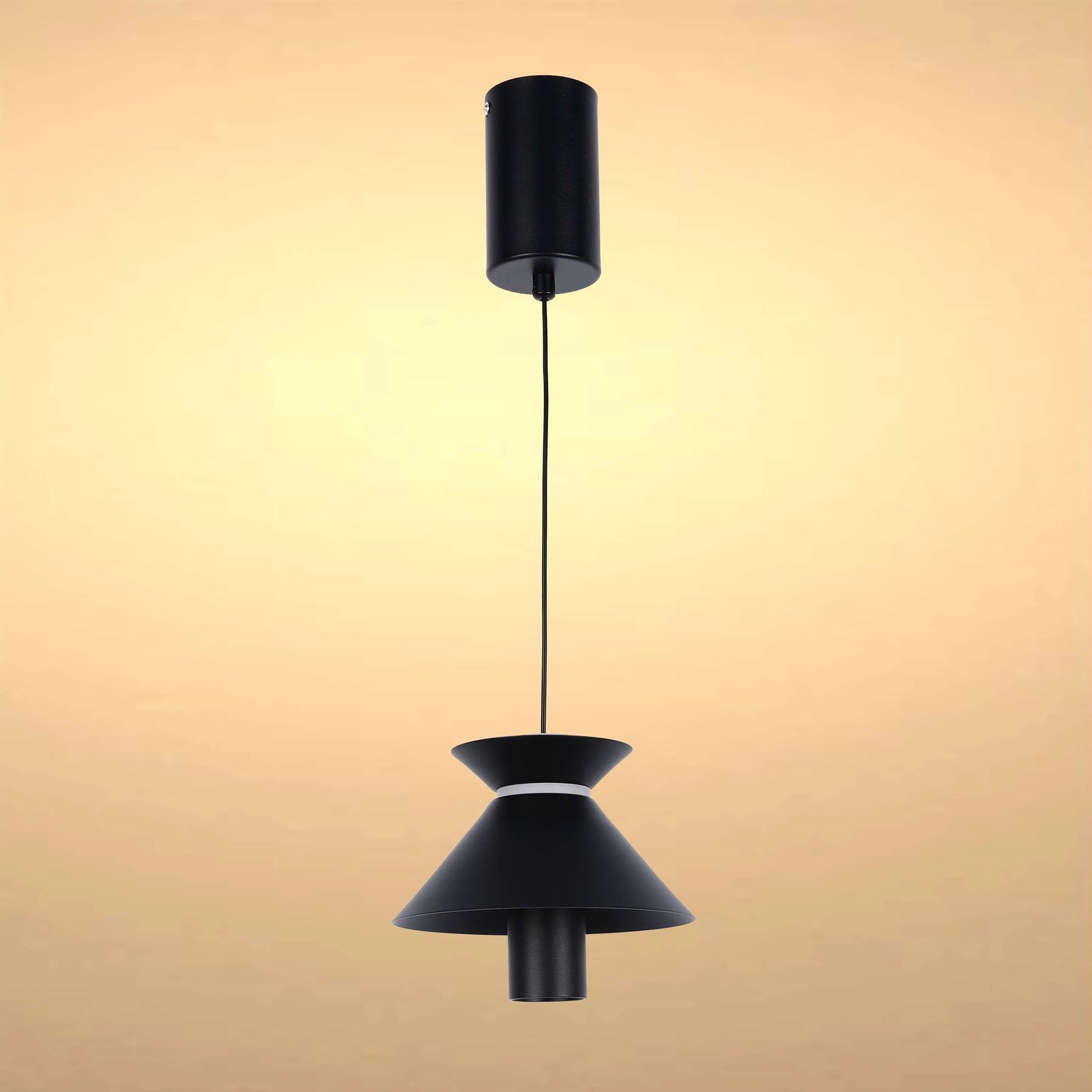 Stylish black pendant light with a cylindrical mount, thin cable and distinctive conical shade. A modern lighting solution.