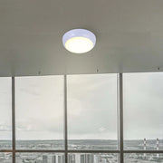 LED Flush Ceiling Light in a modern hallway, featuring a sleek white rim and versatile color temperature options for contemporary decor.118-03616