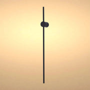 Contemporary black wall light with a minimalist design, providing a soft and modern illumination.