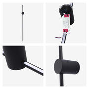 Modern black spotlight lamp with adjustable head. Perfect for minimalist or industrial interiors.