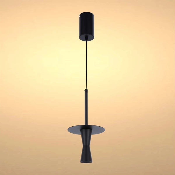 A stylish matte black pendant light hangs against a warm cream background, a striking addition to any modern interior.