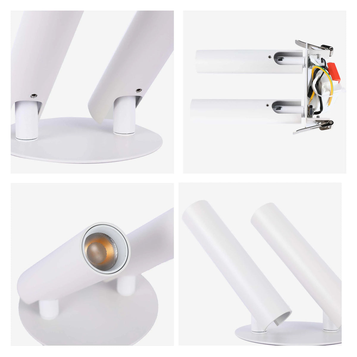 A modern white spotlight with two cylindrical heads on a round base, offering adjustable, focused illumination.