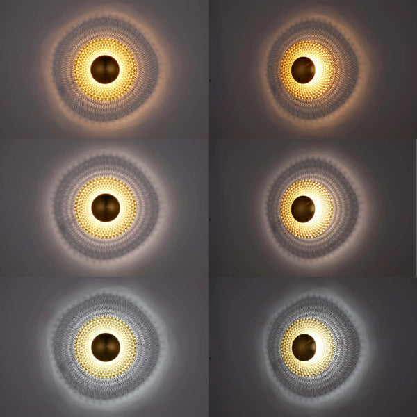 A collection of wall lights, featuring warm to cool tones and decorative diamond patterns, creating a distinct ambience.