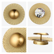A stylish, gold-coloured ceiling light. A decorative piece, perfect for adding a touch of elegance to any room.