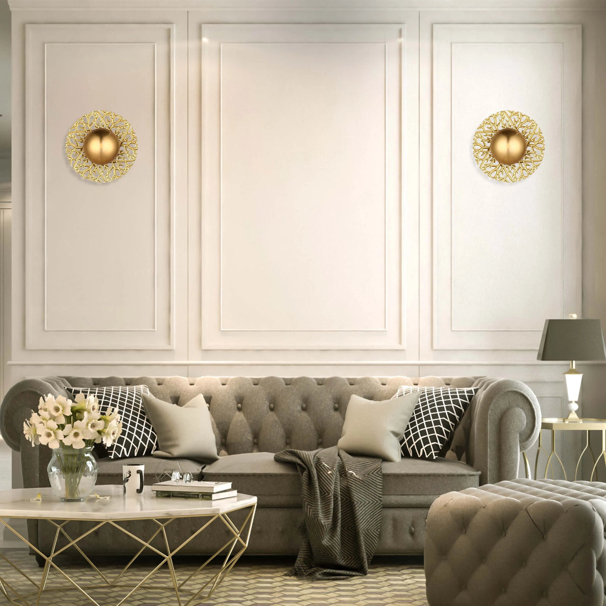Luxurious sitting room with gold-accented wall lighting. A classy, elegant design for discerning customers.
