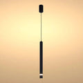 A minimalist, black pendant light provides focussed illumination in a contemporary setting.