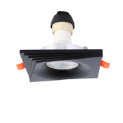 Square LED downlight with a black finish and orange brackets, perfect for modern interiors and energy-efficient lighting solutions.
