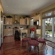 The kitchen features recessed downlights, providing bright and even illumination across the space.
