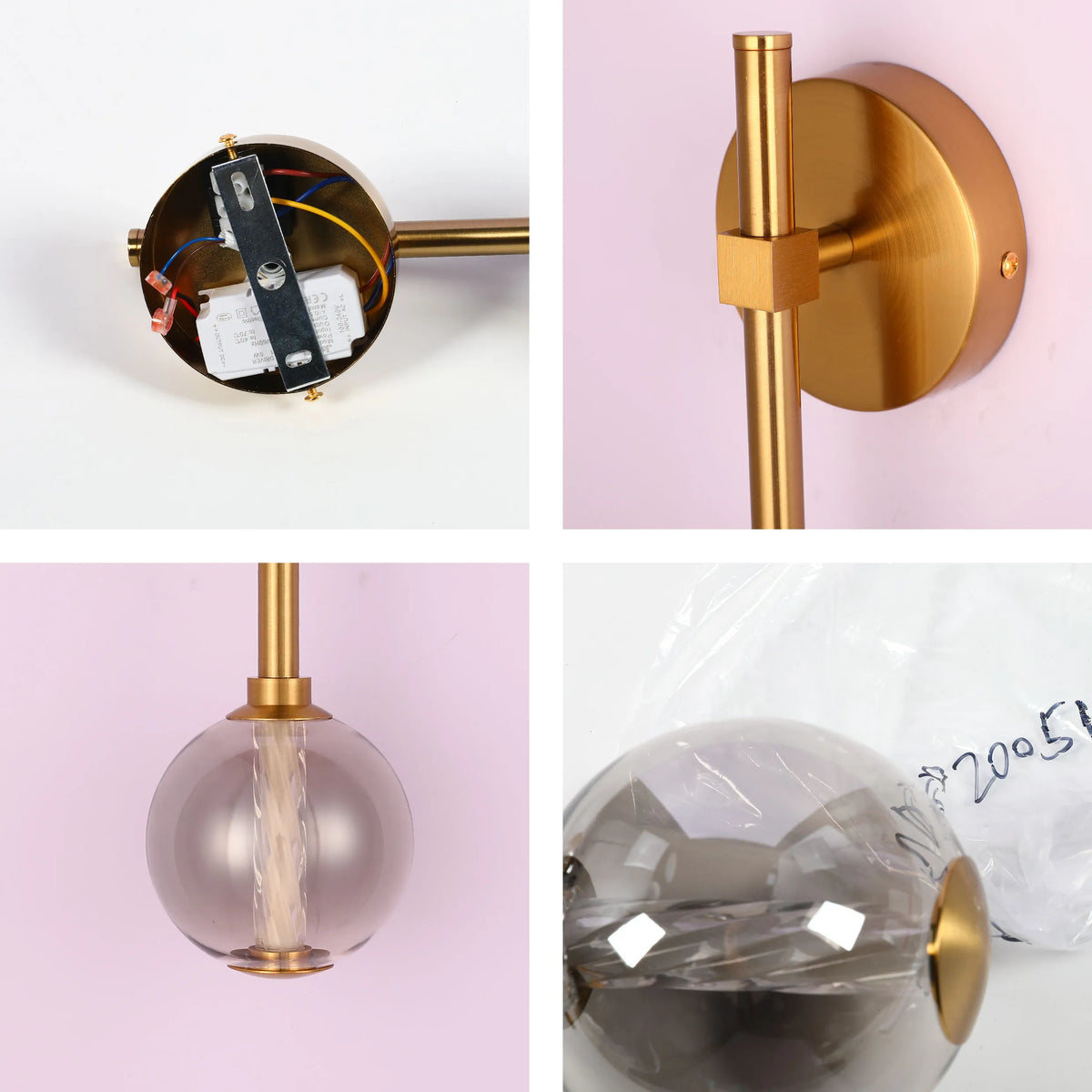 A stylish gold-finish wall light with a smoked glass globe. The light fitting shows off the internal wiring for convenience.