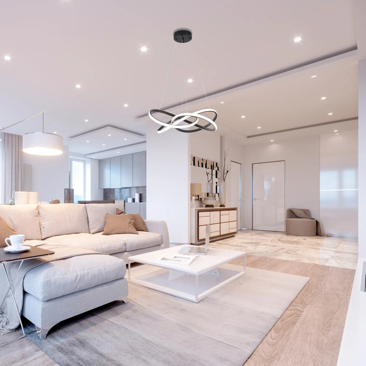 Contemporary living room showcasing a sculptural, ring-shaped pendant light, plus recessed ceiling lights.