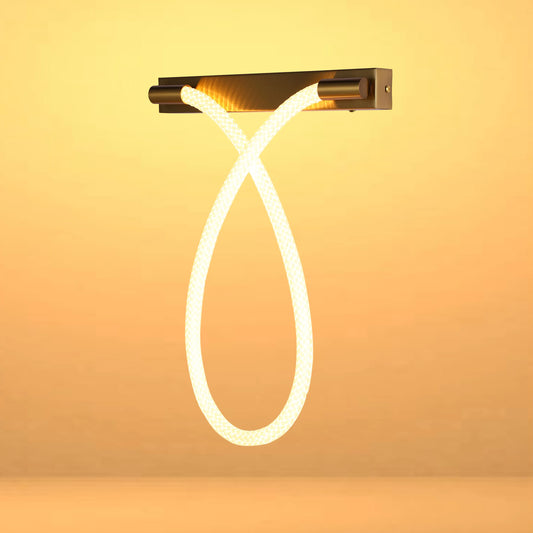 Contemporary wall light with a unique, curved LED rope design. Provides a warm, ambient glow.