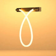 Contemporary wall light with a unique, curved LED rope design. Provides a warm, ambient glow.