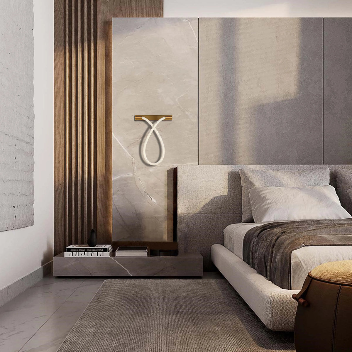 Modern bedroom lighting, featuring a unique, looped wall light. Adds a stylish touch with soft, ambient illumination.
