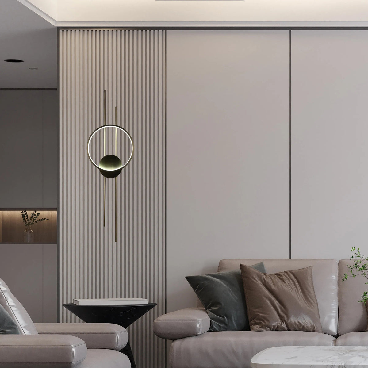 Striking wall lighting fixture with circular illuminated element and gold bars, adding a touch of modern elegance to the neutral colour scheme.