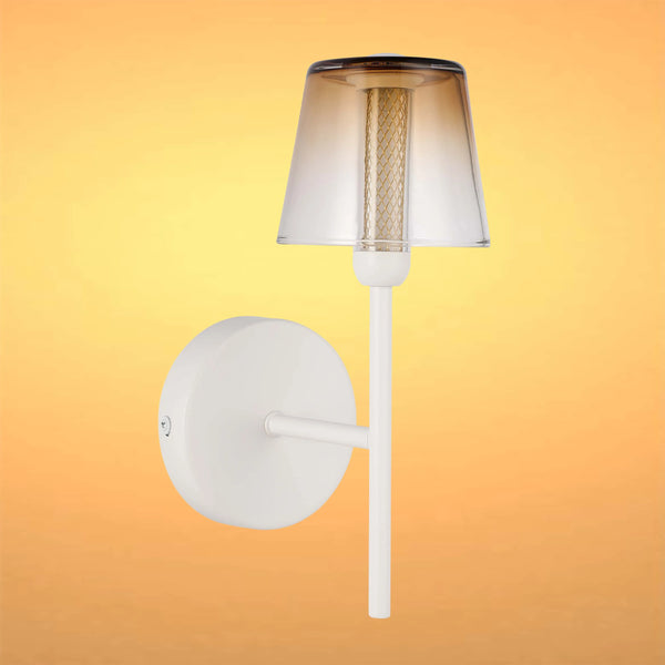 Stylish wall light with a translucent brown shade and white fixture, casting a soft, ambient glow.