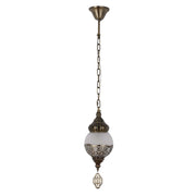 An ornate, hanging pendant light with decorative glass globe and metal accents, suspended by a chain fixture.