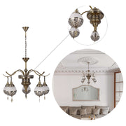 A decorative bronze chandelier featuring five lights, each with patterned glass shades. Creates a warm and inviting atmosphere.