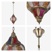 A decorative, multi-coloured, glass mosaic pendant light. The warm bronze finish adds to its vintage appeal.