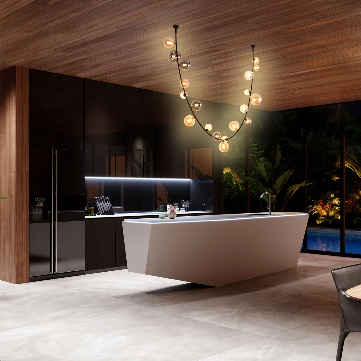 Striking, modern kitchen lighting. Features a unique, spherical chandelier that casts a warm glow, enhancing the room's luxurious feel.