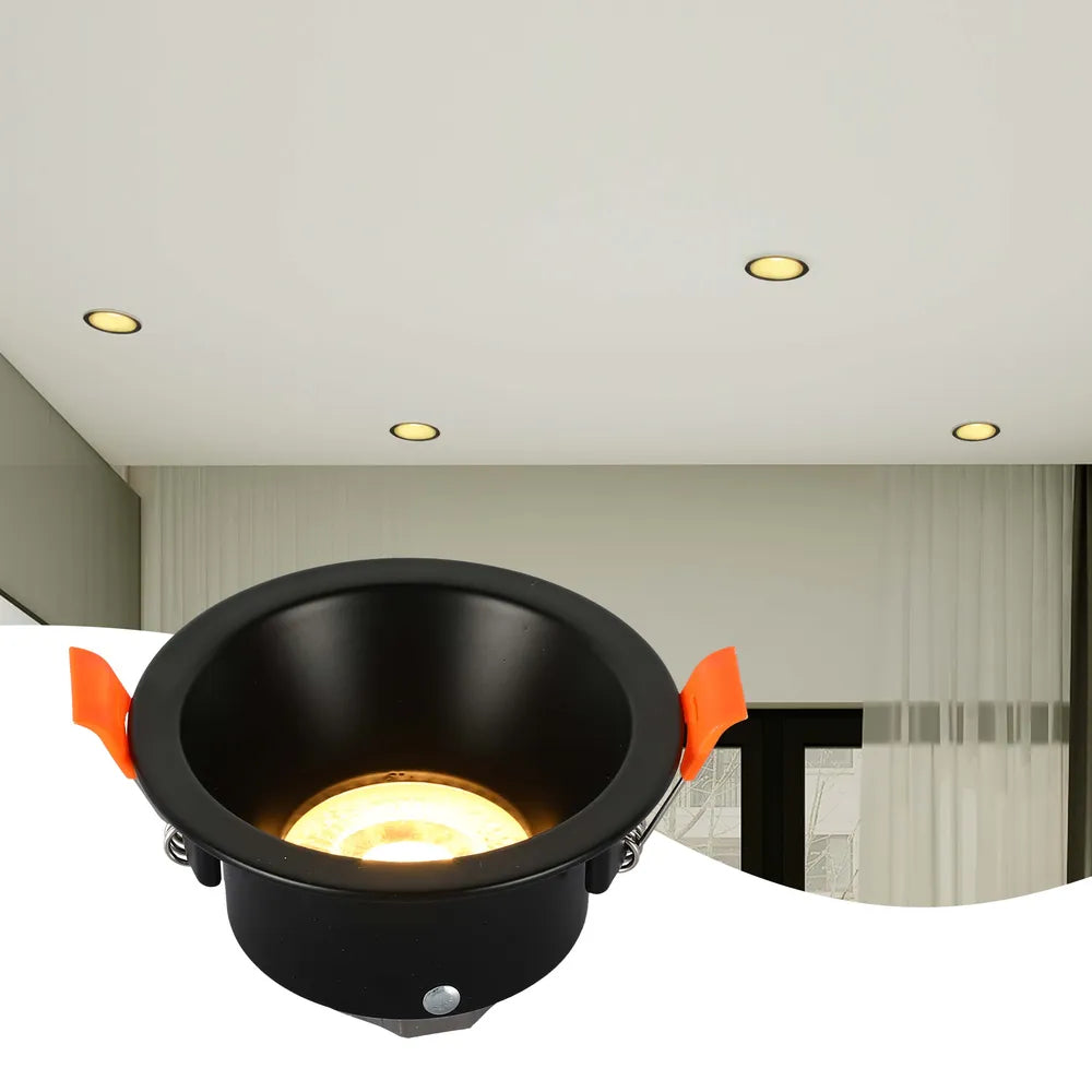 Modern GU10 downlight fixture enhances a sleek kitchen with low-glare illumination, seamlessly blending with contemporary decor.143-03996