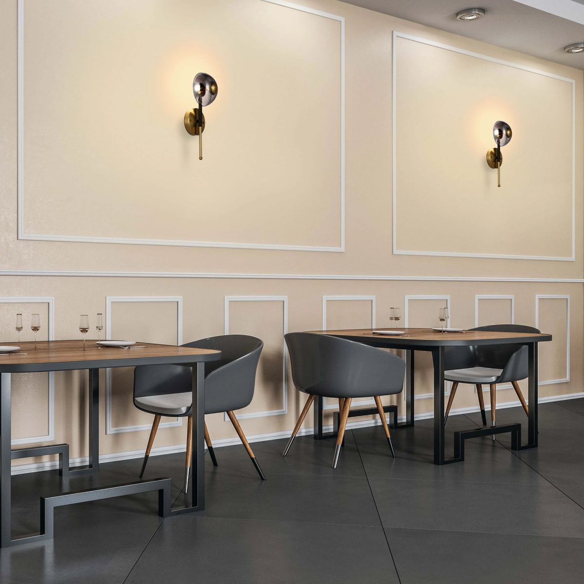 Elegant wall sconces cast a warm glow, adding a touch of sophistication to this modern dining space.
