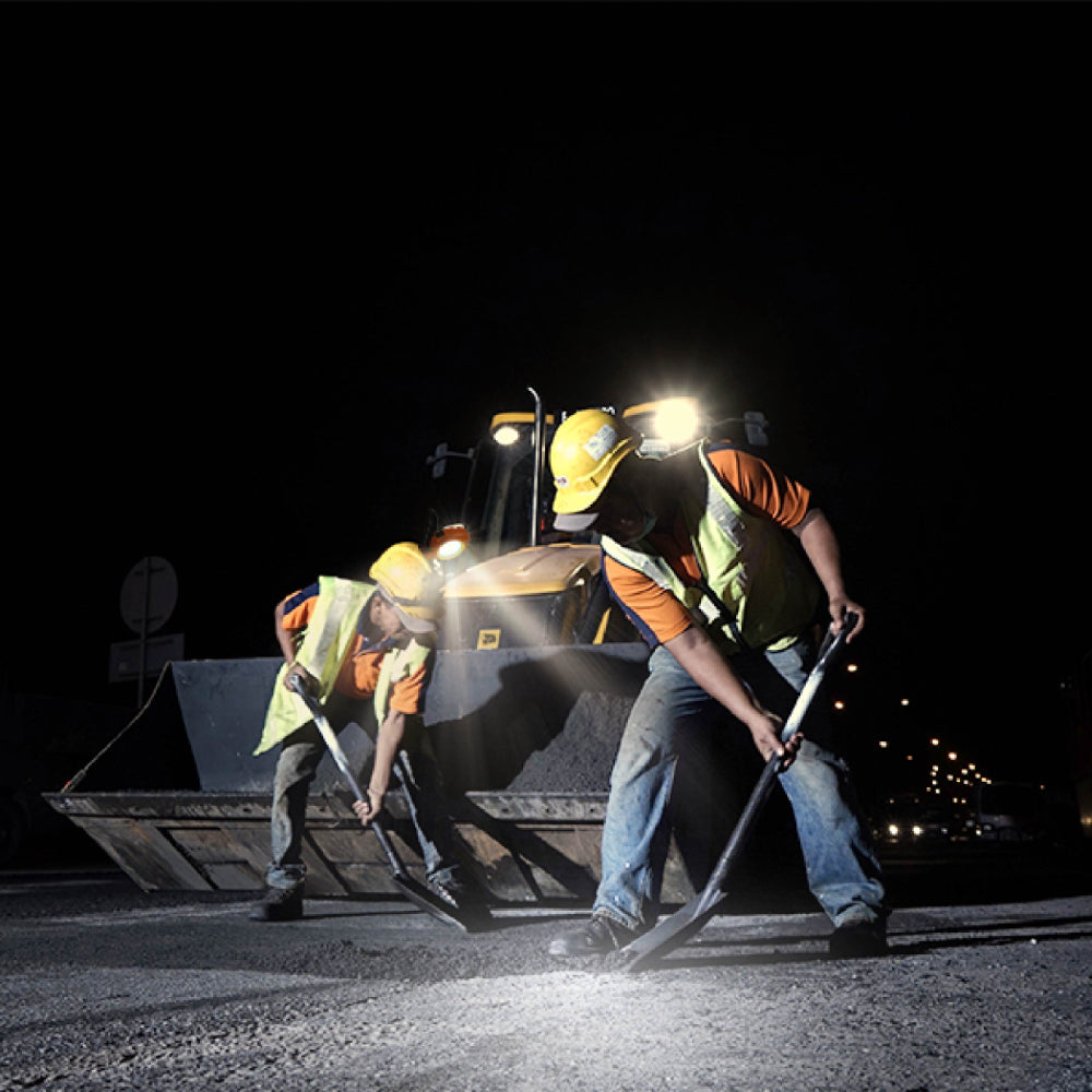road workers use SolarFlex Multi-Purpose Portable Floodlight as flashlight