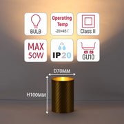 A gold table lamp with a GU10 bulb, a maximum of 50W. It's 100mm tall, 70mm wide, with an operating temperature of -20/+45 °C.