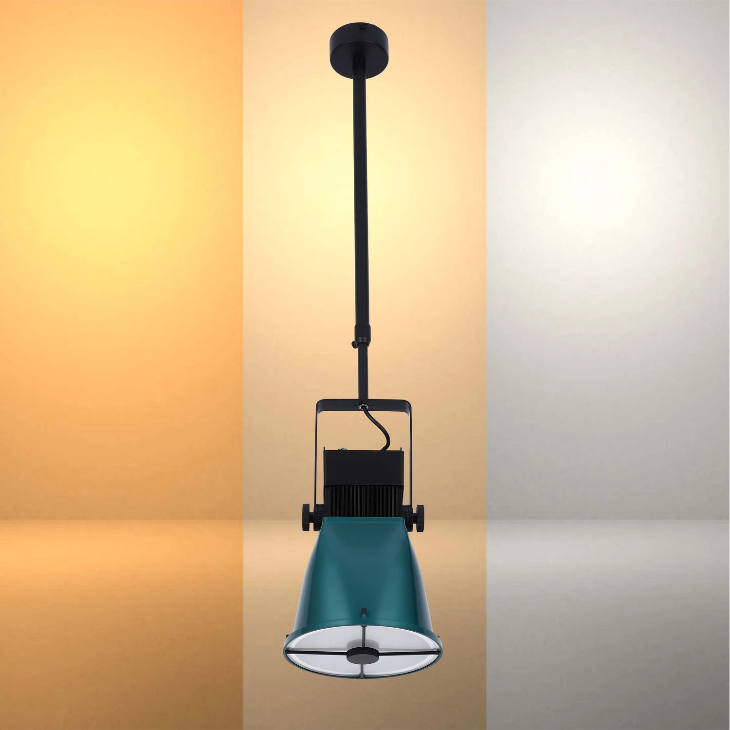 Teal & black industrial-style pendant light fixture. Striking modern piece with adjustable height and a bold pop of colour.