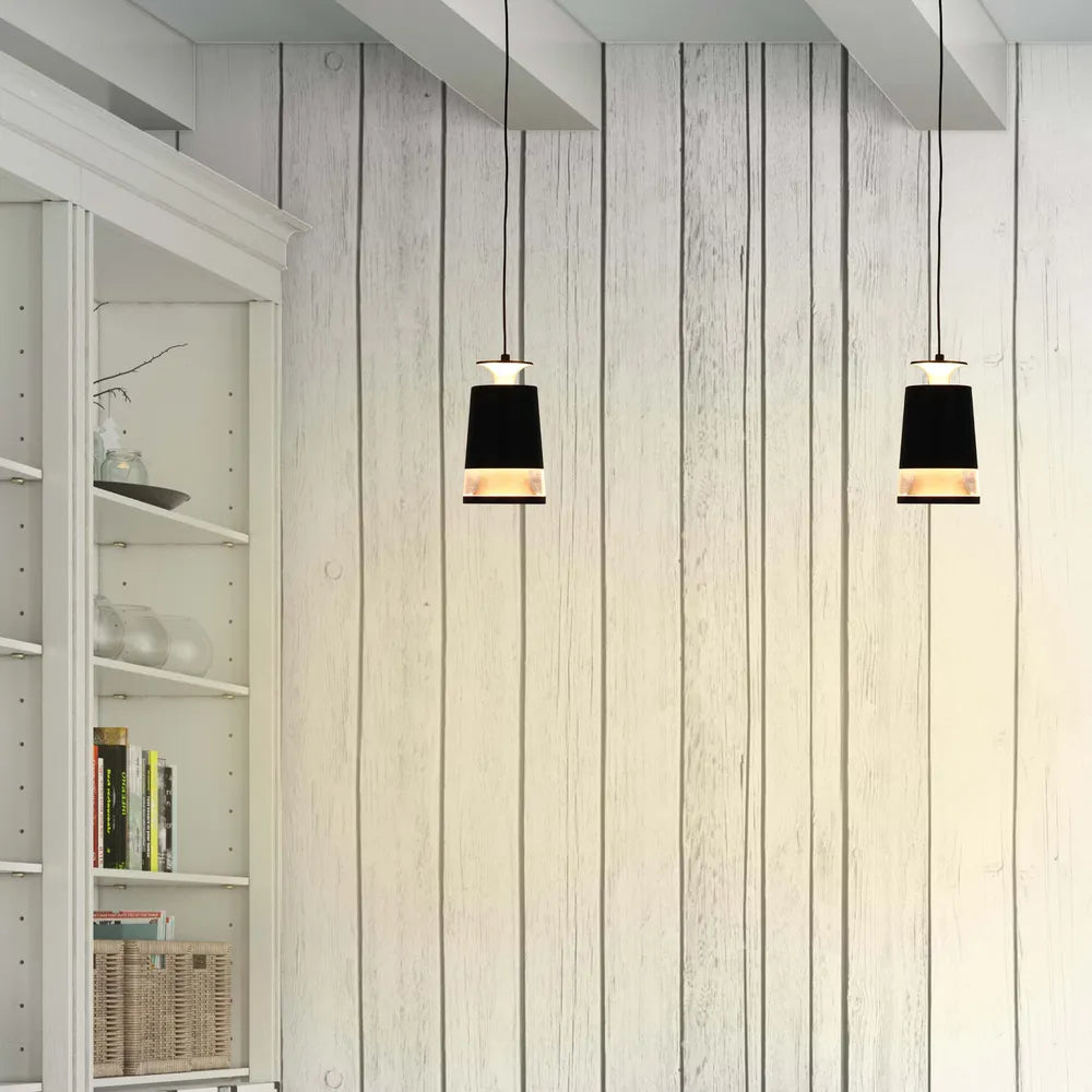 Stylish black pendant downlight enhances a modern dining room, providing warm white light for an inviting atmosphere.150-19082