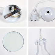 A modern, white pendant light fitting, showing several components laid out on a white surface.