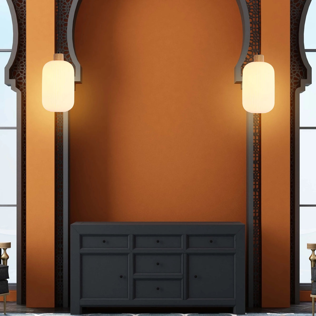 Two pendant lights hang either side of a recessed unit. The lanterns are cylindrical with a warm, ambient glow.