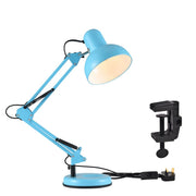 A blue adjustable desk lamp sits next to a black clamp, perfect for a home office or study.
