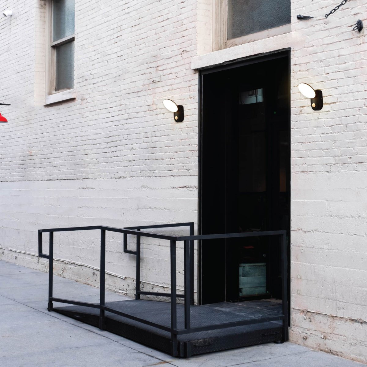 exterior application of Black UFO LED Outdoor Wall Light with PIR Sensor | TEKLED 182-03371