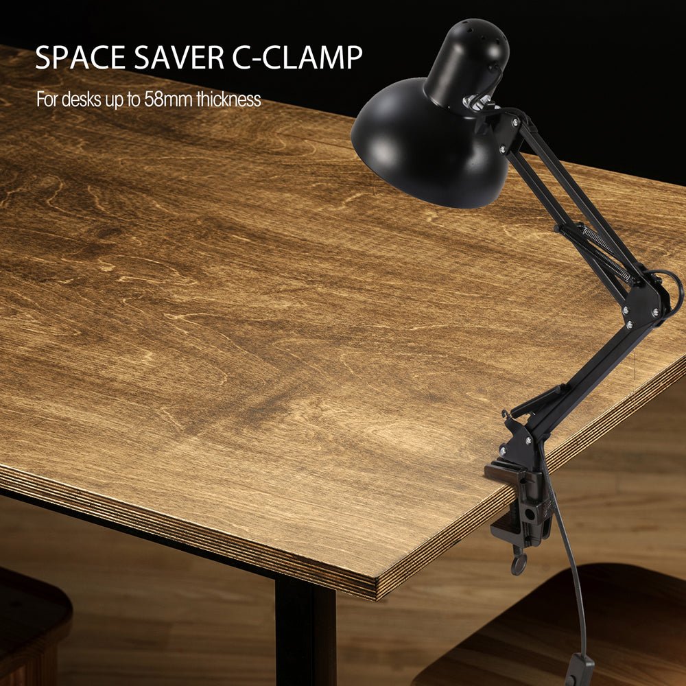 Atlas Architect Swing Arm Black Desk Lamp with Clip E27 c-clamp in use on table