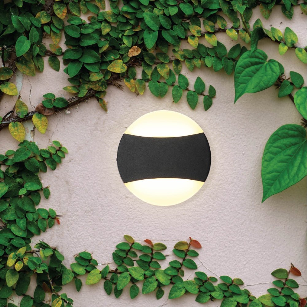 More exterior usage of Black Opal Round Up Down Outdoor Modern LED Wall Light | TEKLED 182-03378