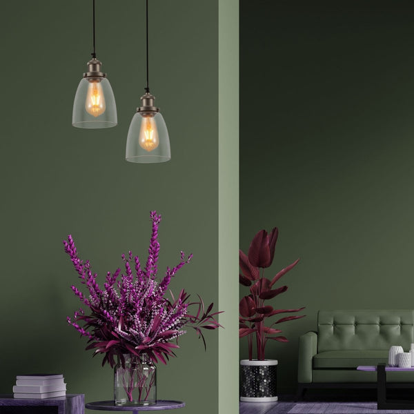 Silver metal clear glass cone pendant light with e27 fitting in indoor setting living room