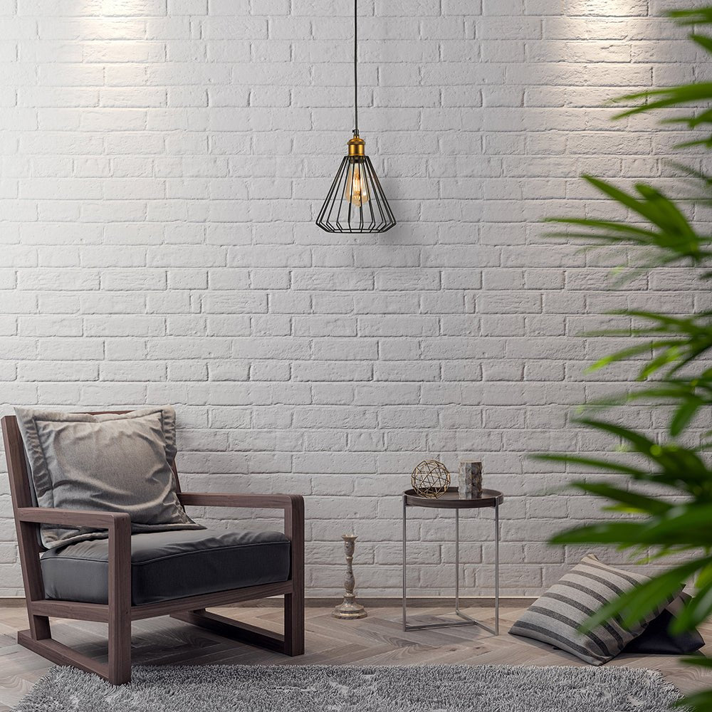 Black metal caged funnel pendant light with e27 fitting in indoor setting living room