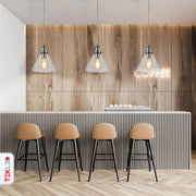 Chrome metal clear glass funnel pendant light with e27 fitting in indoor setting cafe bar top